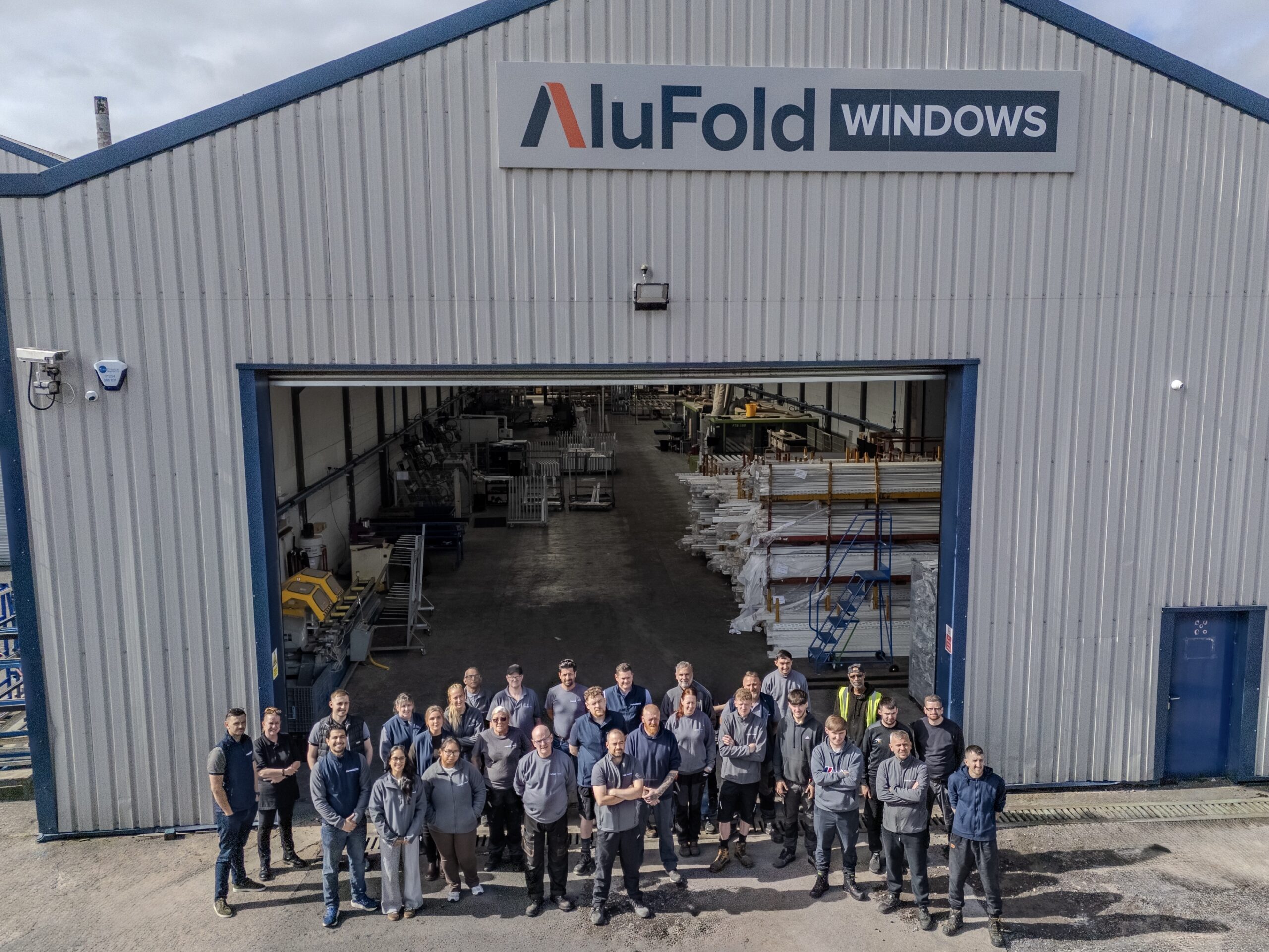 Drone shot of the Alufold Windows team outside the Blackburn factory